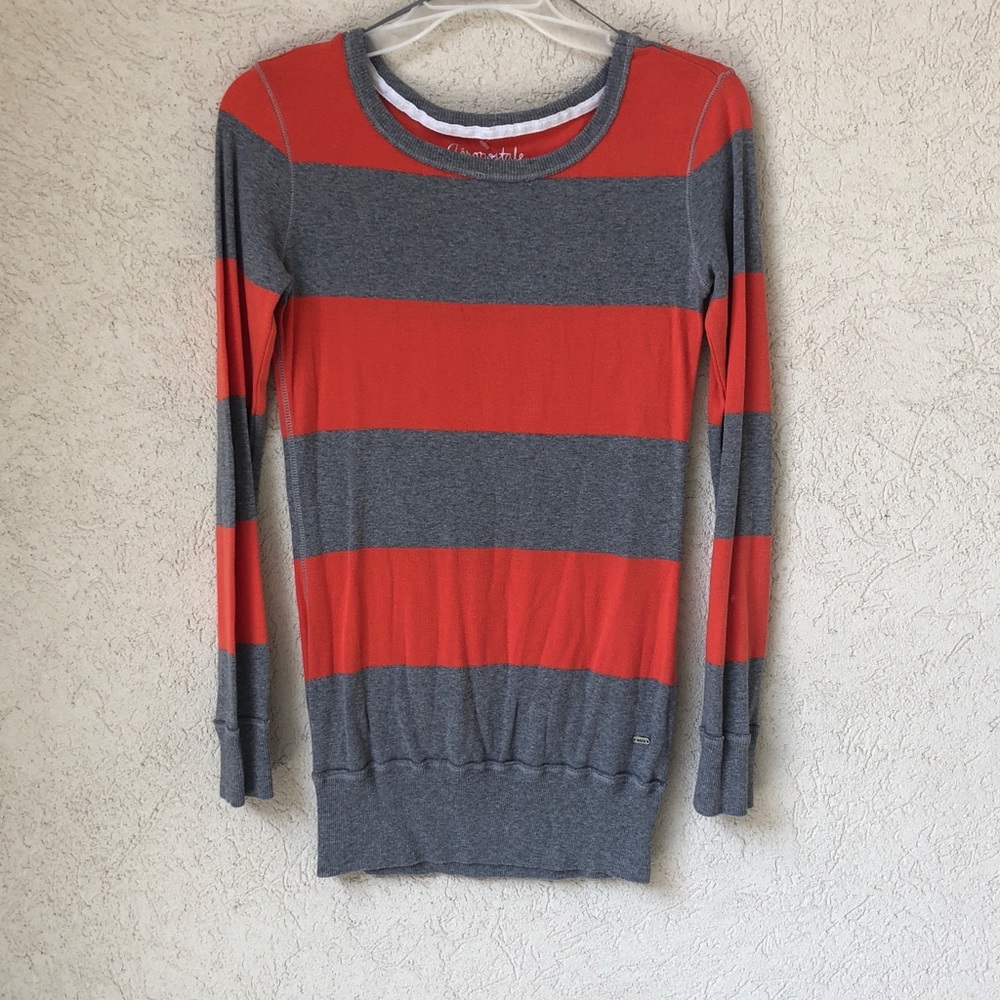 Orange and grey striped sweater